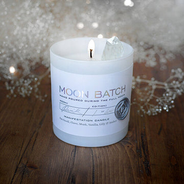 Starlight Blend Soy Candle: Notes of patchouli, clove musk, lily, and amber.
