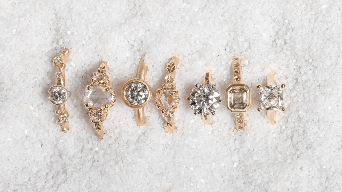 seven diamond and gold custom engagement rings designed by Kate Maller Jewelry
