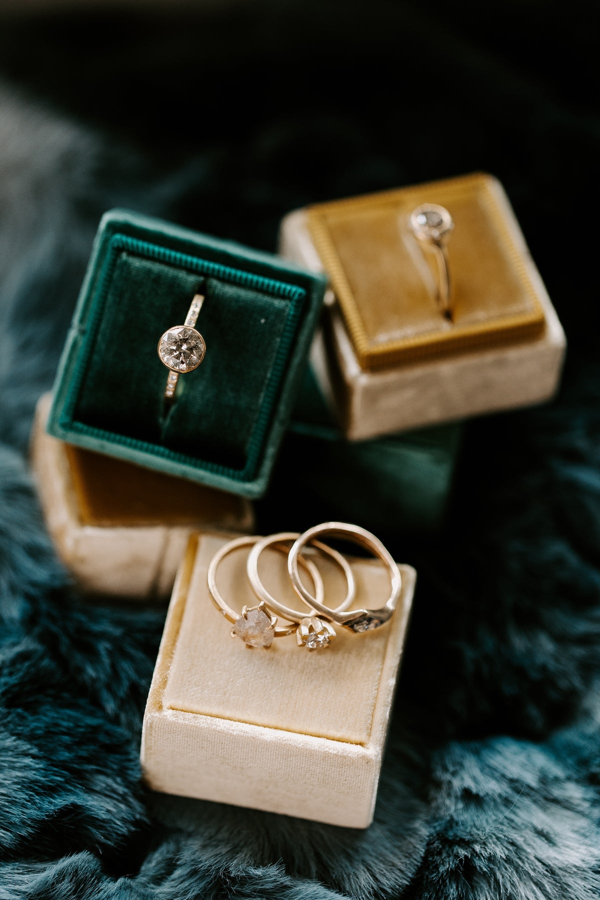 custom hand made engagement rings set in velvet jewelry boxes